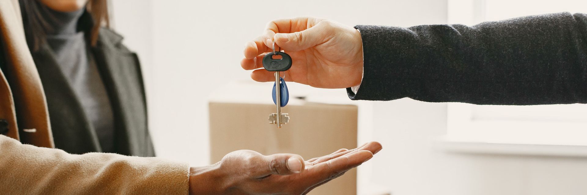 Keys being handed to a new owner