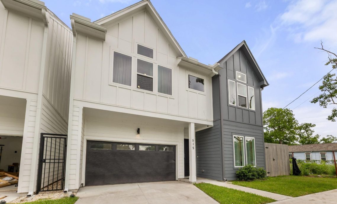 Front of 515 Altic St, a two-story modern farmhouse-style home with a two-car garage